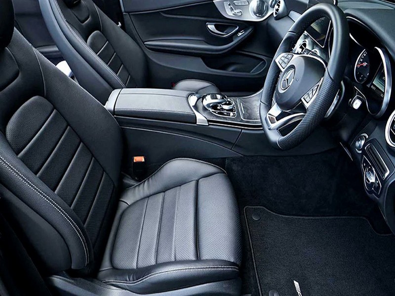 Clean luxury car interior after professional emergency cleanup service