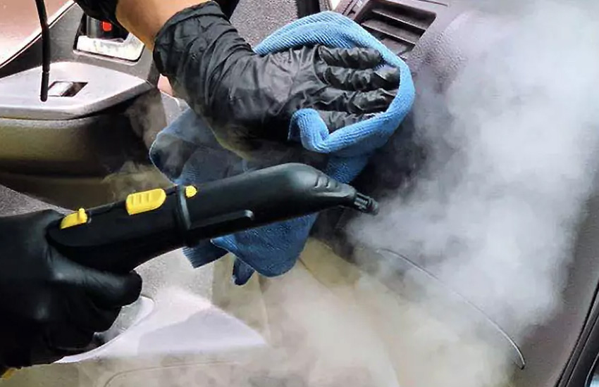 Professional steam cleaning of vehicle interior