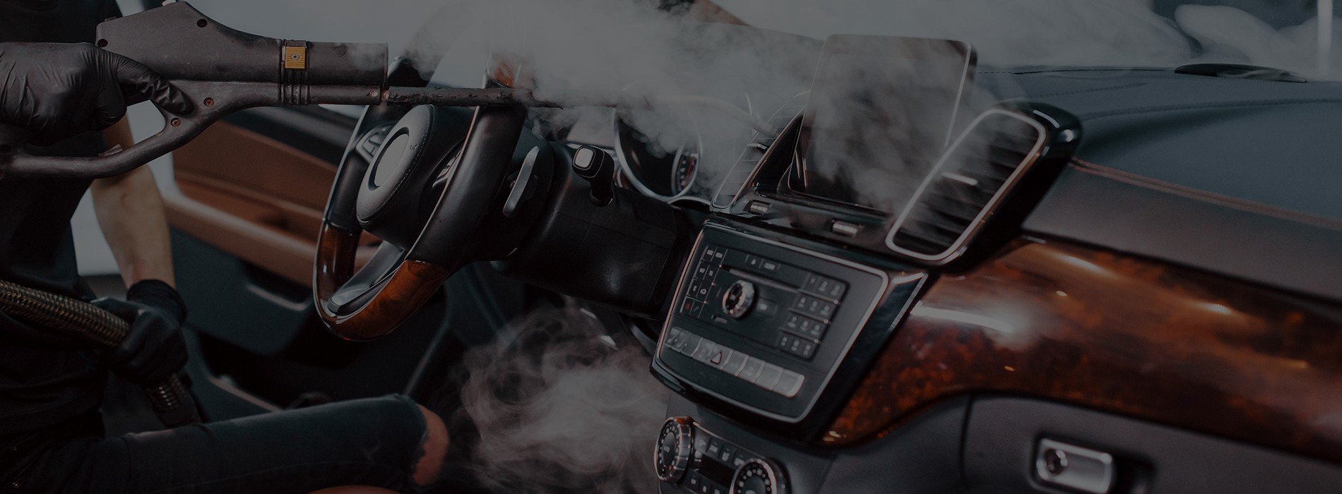 Professional car detailing steam cleaning luxury interior